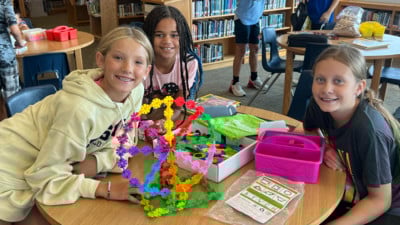 Fifth grade students building a Ferris Wheel with Brain Flakes